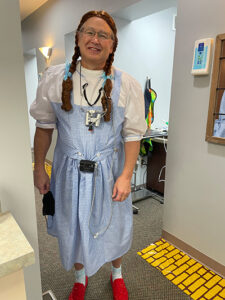 Dr. Snyder dressed up as Dorothy from the Wizard of Oz for Halloween